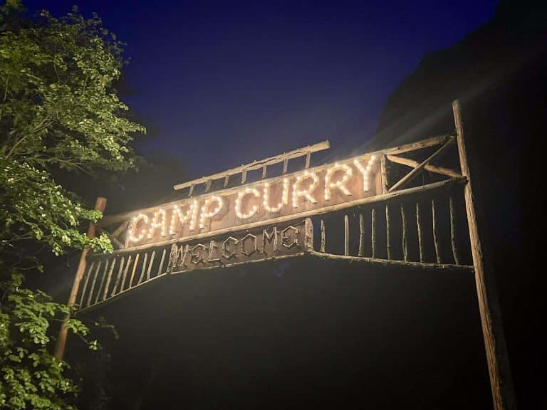 Yosemite Lodging - Camp Curry sign at night