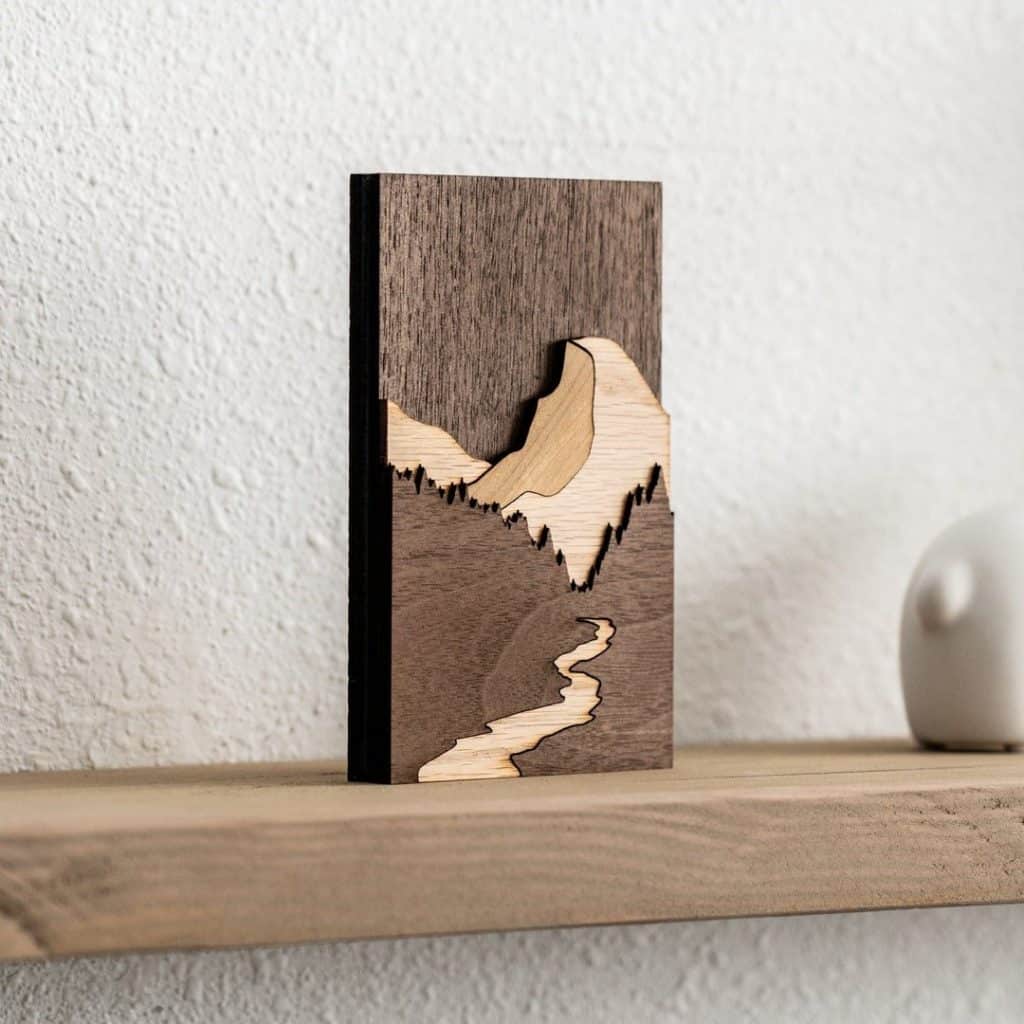 Laser-cut hardwood Half Dome art by PathAndOak on a shelf